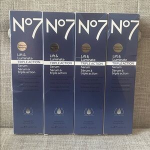 No7 Lift & Luminate Triple Action Serum — Navy Blue.